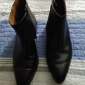 Black leather Coach boots
